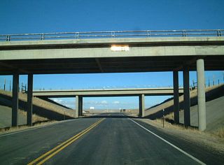 The exchange joining Cooper Cove Road and I-80 is located within a sparsely populated area east of Woodedge and Deer Mountain.