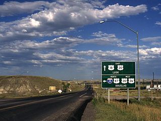 U.S. 18 begins in Orin Junction at the interchange with Interstate 25 and U.S. 20-26-87. These signs are present along eastbound at the Interstate 25 junction.