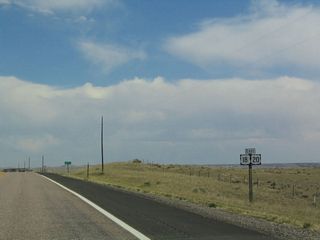 This is the first shield assembly for U.S. 18-20 eastbound as the paired route travels east parallel to the railroad en route to Shawnee, Lost Springs, Keeline, and Manville.