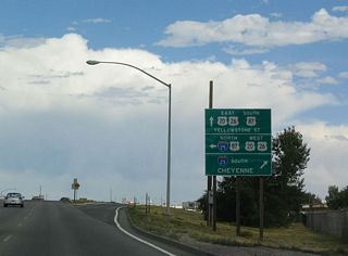 Eastbound Business Loop I-25 and U.S. 20-26 Business-87 reaches its junction with Interstate 25 and U.S. 20-26-87. Follow Interstate 25 southeast to Douglas and Cheyenne. While the three U.S. routes remain on their original alignment between this interchange and Glenrock, they all rejoin Interstate 25 at Exit 160. After passing through Douglas, U.S. 20 splits off the freeway at Exit 126, Orin Junction. U.S. 26 follows the Oregon Trail by exiting the freeway at a tri-level stack interchange at Exit 92. U.S. 87, of course, stays with Interstate 25 until reaching Raton, New Mexico.