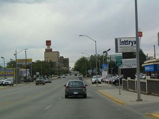 A few of the mid-rise towers come into view on westbound Business Loop I-25 and U.S. 20-26 Business-87, including the First Interstate Bank.