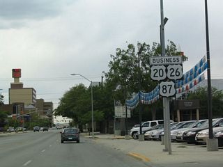 Passing by the Wyoming Financial Center to the right, First Street (Business Loop I-25/U.S. 20-26 Business-87) continues west into downtown Casper.