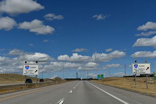 Signs such as this one advising whether a major highway is closed ahead due to weather or traffic issues appear at major interchanges in Wyoming.