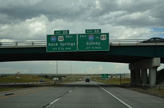 I-25/U.S. 87 and Interstate 80 meet at a cloverleaf interchange where each ramp is assigned a letter. The B an D suffixes are used along I-25 while A and C are assigned to ramps from I-80. This logic appears to be unique to WYDOT.