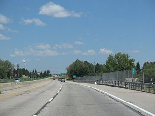 I-25 passes over a series of bridges over Lake Absarraca, which is also known as Country Club Lake within Frontier Park. The lake is part of the larger complex at  Frontier Park that also includes an arena and concert venue.