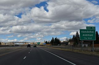 Exit 13 joins I-25/U.S. 85-87 with Vandehei Avenue in a quarter mile. Vandehei Avenue along with Gardenia Drive serve northern Cheyenne suburban developments.