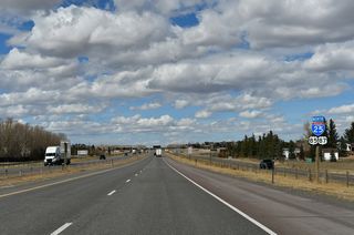 Suburban development extends northward along Interstate 25 to WY-211 (Horse Creek Road).