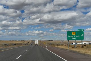 Traveling northwest from Exit 16, WY-211 (Horse Creek Road) eventually parallels a BNSF Railroad line to Federal, Horse Creek and Iron Mountain. The northern section of WY-211 ties into I-25/U.S. 87 at Exit 54 near Chugwater.