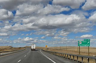 U.S. 85 departs I-25/U.S. 87 north at Exit 17 by the Ranchettes community. A long distance connection to Sundance and Devils Tower is afforded via U.S. 85 and Wyoming Highway 585 at Four Corners.