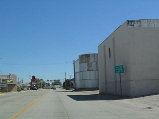 Eastbound U.S. 26 and southbound U.S. 85 prepare to split as Valley Road approaches Main Street after the Wyoming 159 (West C Street) intersection and traffic signal.