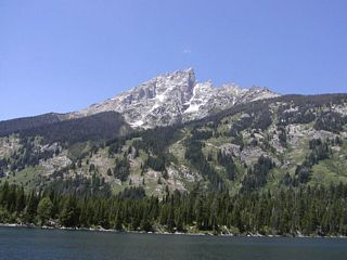 Jenny Lake, along with Jackson Lake and Leigh Lake, are among the largest lakes in Grand Teton National Park. Located west of the main U.S. 26-89-191, a fee is required to access Jenny Lake and hike around its trail system. These views are afforded from a boat on Jenny Lake.