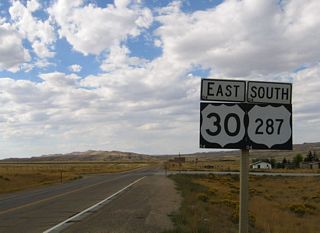 North of the Interstate 80 junction at Walcott, U.S. 30 east and U.S. 287 south follow the original route of the Lincoln Highway toward Hanna, Medicine Bow, Rock River, and Bosler before rejoining Interstate 80 at Laramie. The Lincoln Highway followed a variety of alignments before adopting the current route of U.S. 30-287; Interstate 80 between Laramie and Walcott never was part of the official Lincoln Highway corridor across the country.