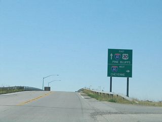 The connector road between the Lincoln Highway and Interstate 80 intersects at a diamond interchange. U.S. 30 merges onto Interstate 80 east.