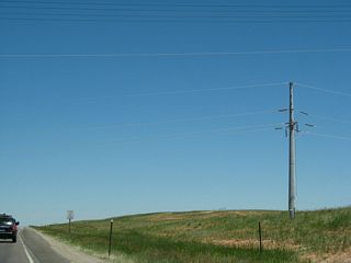 Power lines cross over U.S. 30 and U.S. 287.
