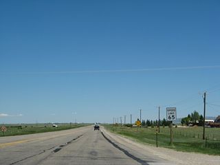 The speed limit along U.S. 30 and U.S. 287 increases to 65 miles per hour, and the right lane ends. The four-lane highway will reduce to a two-lane highway. Most roadside businesses start to dissipate, and U.S. 30 and U.S. 287 enter rural, undeveloped areas on the drive between Laramie and Bosler.