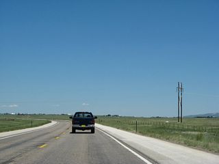 A single-circuit power line passes over U.S. 30-287.