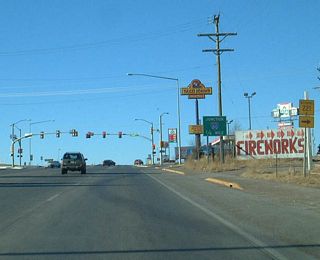 U.S. 85 changes from Greeley Highway to Central Avenue as the highway meets Fox Farm Road (Wyoming 221) just south of the Interstate 80 interchange. Take Fox Farm Road (Wyoming 221) east to Morrie Avenue and Wyoming 212. Morrie Avenue passes under Interstate 80, while Wyoming 212 follows College Boulevard around eastern Cheyenne and connects to Laramie County Community College on the southeastern corner of metropolitan area.