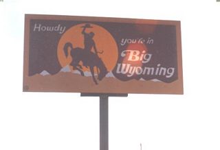 This billboard -- which stated, "Howdy, You're in Big Wyoming" -- was located along northbound U.S. 85 just across the Colorado-Wyoming State Line.