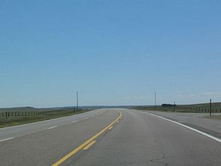 Most of the route between Lusk and Lingle is a two-lane highway, with passing allowed where sight distances permit. 