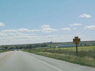 U.S. 85 and Wyoming 92 split shortly after crossing the North Platte River. Wyoming 92 travels into Nebraska, where it becomes Nebraska 92. The same route number extends across four states, with the route ending in La Moille, Illinois at U.S. 34. Wyoming 154 turns west from this area toward Veteran, while Wyoming 92 travels toward Huntley.