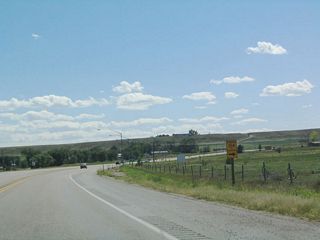 Wyoming 154 is a longer alternate route to U.S. 85, traveling west to Veteran and then turning south to Yoder and then turns east back to U.S. 85.