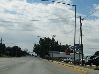 The three routes divide at College Drive. Business Loop I-25 (signed as To Interstate 25 here) and Business U.S. 87 turn right onto College Drive (Wyoming 212). U.S. 85 continues south into Colorado.