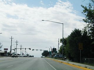 While Wyoming 212 travels east-west here, Business Loop I-25 and Business U.S. 87 turn west to follow Wyoming 212 back to Interstate 25 and U.S. 87.