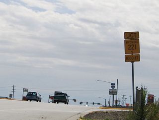 Continuing south after the Interstate 80 interchange, southbound Business Loop I-25/U.S. 85-87B approaches Fox Farm Road (Wyoming 221). This secondary state route travels east from Greeley Highway to meet College Drive (Wyoming 212) on an alignment roughly parallel to Interstate 80 between Exits 362 and 364.