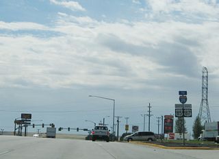 The business loop is signed as "To Interstate 25" rather than with a green business shield. While this is a fairly common method of signing such routes in Wyoming, it makes it harder to follow business loops.