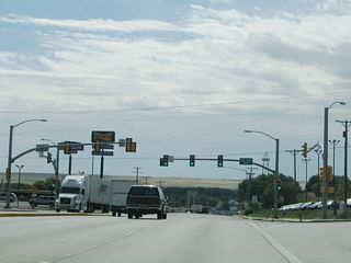 Southbound Business Loop I-25 and U.S. 85-87B reaches Wyoming 221, Fox Farm Road. The business route continues south along Greeley Highway into southern Cheyenne.