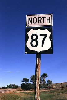 Northbound U.S. 87 shield near Story.