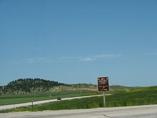 Turn right (east) on Old U.S. 14 (I-90 Frontage Road) to the Vore Buffalo Jump and the Northeast Wyoming Information Center (note the change in signs between 2008 and 2010). The Vore Buffalo Jump is a major archaeological site located between Old U.S. 14 and Interstate 90 on the north side of the freeway.