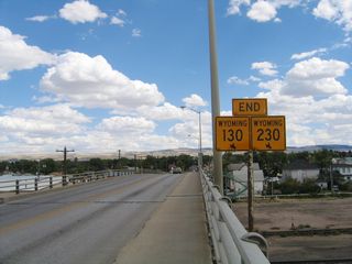 Crossing over the Union Pacific Railroad near downtown Laramie, Wyoming 130 and Wyoming 230 come to a joint end as the highway approaches Third Street (Junction Business Loop I-80 and U.S. 30-287).