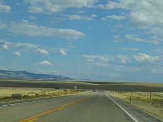 Vast sagebrush plains and rolling hills dominate the view on southbound Wyoming 130-230 after Walcott Junction. The North Platte River rarely comes into view, even though it parallels the highway just to the west.  Along the route are several connecting county routes that offer ranch access and river access.