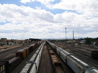 This is a view of the Union Pacific Railroad tracks looking south as seen from the sidewalk on Wyoming 130-230 (Snowy Range Road) in Laramie.