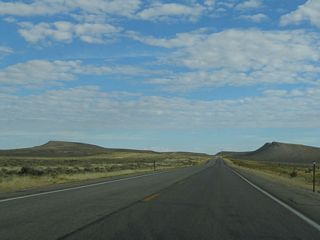 This suite of pictures shows the rolling hills and sagebrush filled landscape between Saratoga and Walcott Junction. The North Platte River flows north on a route parallel to Wyoming 130, but it is seldom visible.