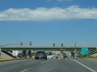 Northbound Business Loop I-25, U.S. 85, and Business U.S. 87 (South Greeley Highway) transitions directly onto northbound Interstate 180 (Central Avenue) upon passing under Interstate 80 in Cheyenne.
