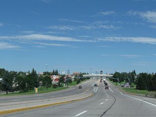 After the Crow Creek bridge, Interstate 180 and U.S. 85 approach the Fifth Street traffic signal.