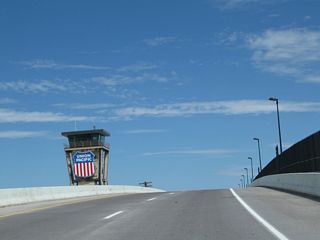 A control tower regulates the flow of train traffic through the Union Pacific railyard. It is located strategically between the two viaducts that comprise the twin carriageways of Interstate 180 as the highway crosses the railroad yard.