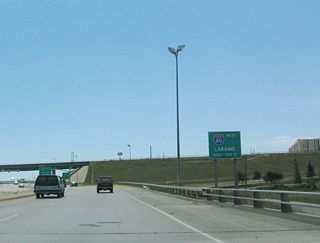 This is the viaduct over Crow Creek and First Street. Southbound Interstate 180 approaches its junction with Interstate 80. Turn right onto westbound Interstate 80 to Interstate 25 and to Laramie in Albany County.