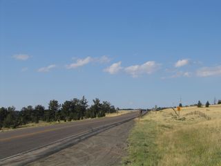 Due to topography, Wyoming 210 actually starts its "eastbound" journey by traveling slightly northwest, then curving north and then east. This is the first route marker, which is located near Interstate 80's Summit Rest Area. This route marker faces traffic headed toward Curt Gowdy State Park just off the Summit Rest Area on Interstate 80/U.S. 30. This interchange is where Wyoming 210 has its western end, just before Interstate 80 travels west toward Laramie.