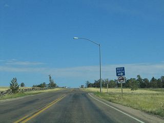 Leading into the rest area at the Sherman Hill Summit is this sign; continue straight ahead toward Blair-Wallis Recreation Area.