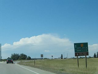 After the Interstate 25 interchange, Wyoming 210 approaches the turn off to Warren Air Force Base.