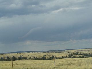 Late summer thunder clouds developed over the high plains leading to the foothills.
