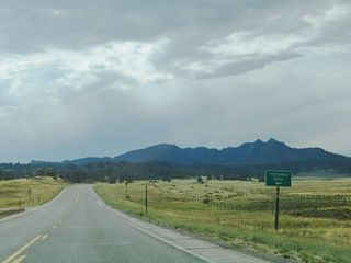 A dirt road (Forest Service Road 700) connects Wyoming 130 to Vedauwoo, home of myriad rock formations and other geological oddities.