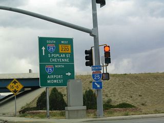 WY-220 begins south along Poplar Street at a diamond interchange (Exit 188 B) with Interstate 25 just west of the North Platte River at Casper.