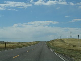 A 345kV, single-circuit power line crosses over WYO 225 in this scene.