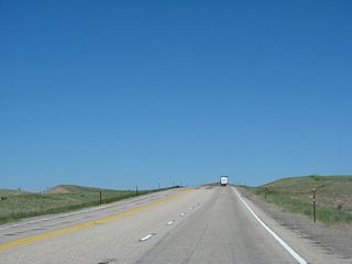 A set of major power lines cross over U.S. 287. Bringing power from some major coal-fired power plants located near Craig, Colorado, these lines travel to and serve the Front Range area of Colorado as well as connecting to Cheyenne's power grid. The larger of the two single-circuit lines is set at 345kV.