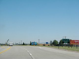 Northbound U.S. 287 approaches the turnoff to the Port of Entry (weigh station).