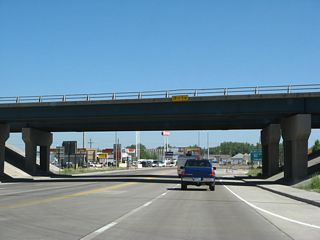 Northbound U.S. 287/Third Street passes under Interstate 80, the Laramie Marginal (bypass).